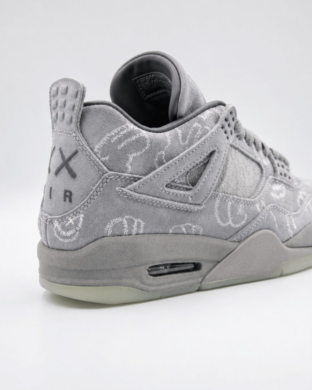 Air Jordan 4 Retro x KAWS Cool Grey